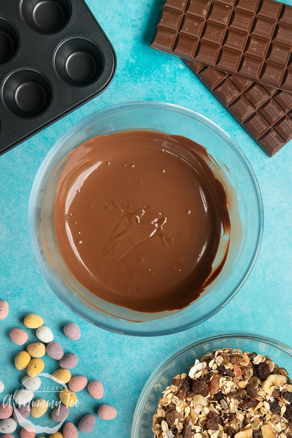 Overhead shot of melted chocolate in a microwave-safe bowl
