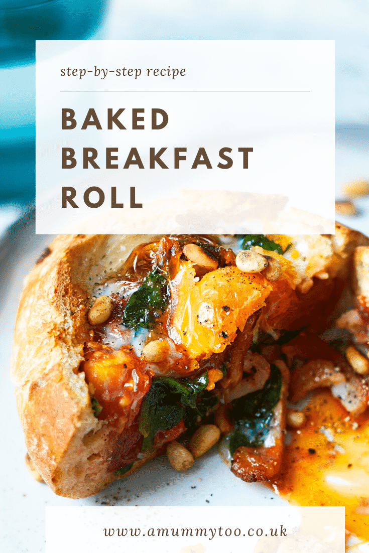 A breakfast roll on a white plate. It is filled with sausage, bacon, spinach, tomatoes and pine nuts, topped with an egg. The roll is cut open to reveal the runny egg yolk. The caption reads: step-by-step recipe baked breakfast roll