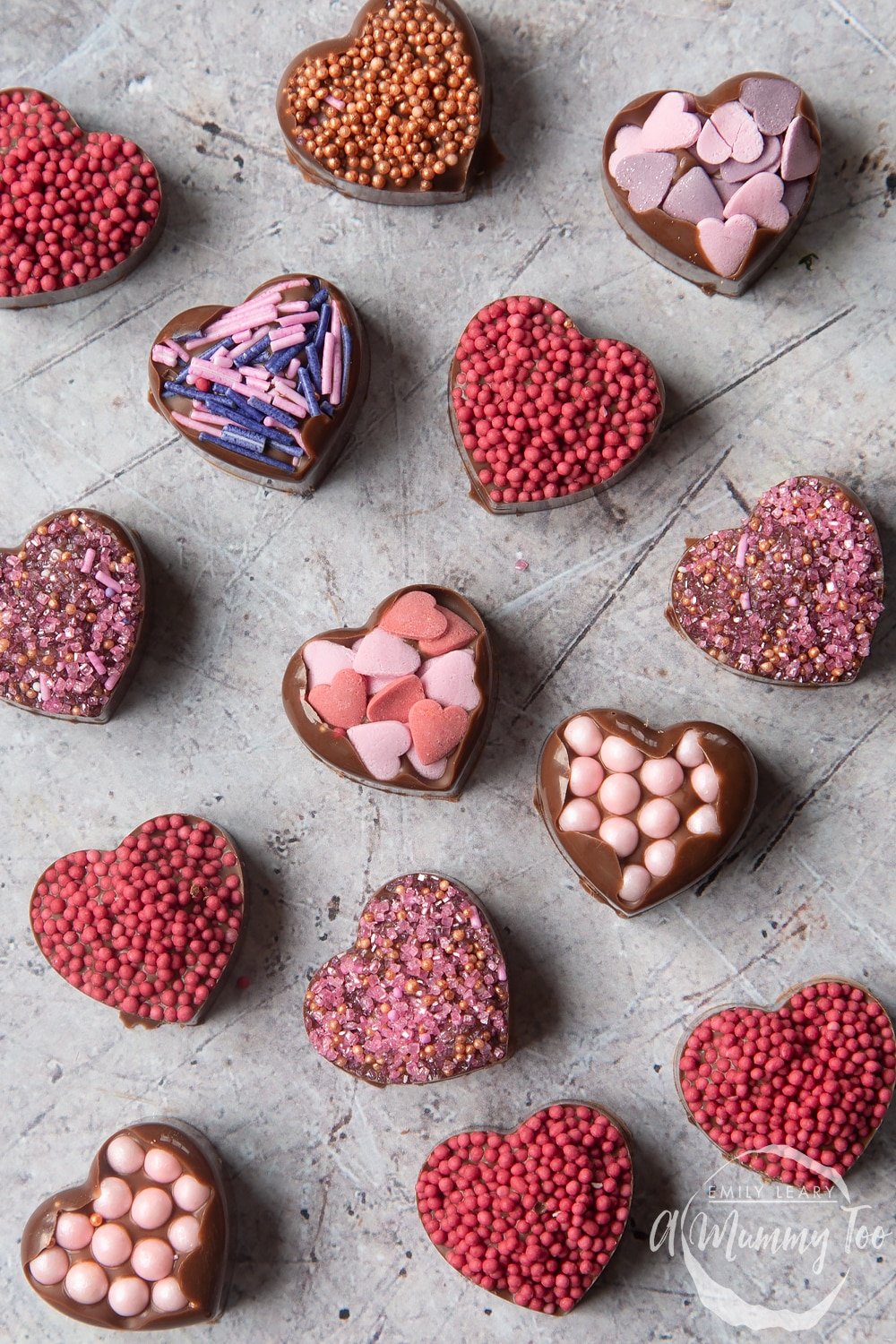 Overhead shot of chocolate hearts with a mummy too logo in the lower-right corner