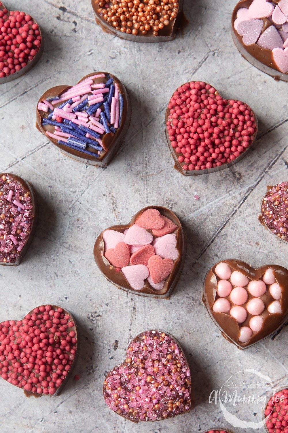 Overhead shot of chocolate hearts with a mummy too logo in the lower-right corner