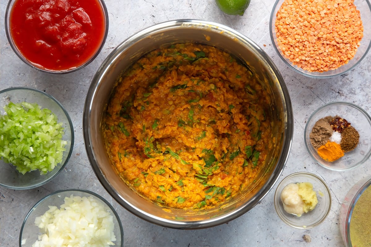 Overhead shot of low fat lentil curry in a slow cooker metal bowl