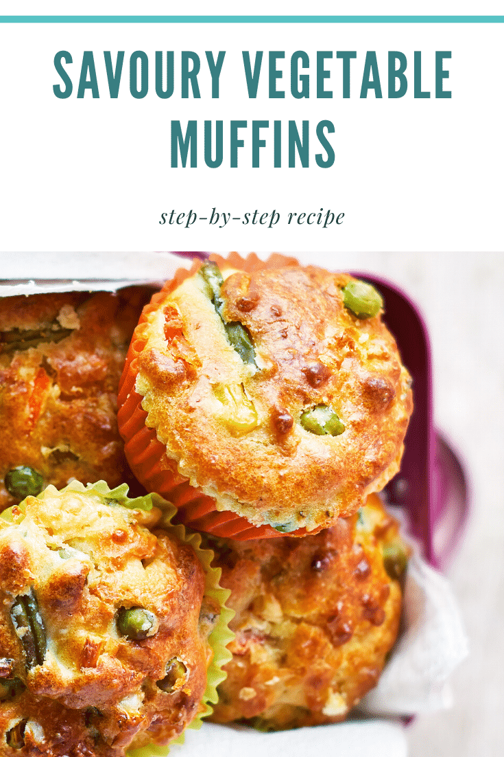 A close up a savoury vegetable muffins in a pink lunchbox lined with paper on a wooden background. The caption reads: savoury vegetable muffins step-by-step recipe