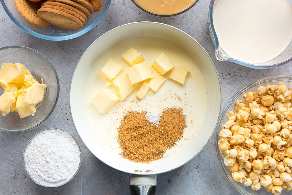 cream, butter, sugar and salt in a saucepan with ingredients in bowls around the pan.