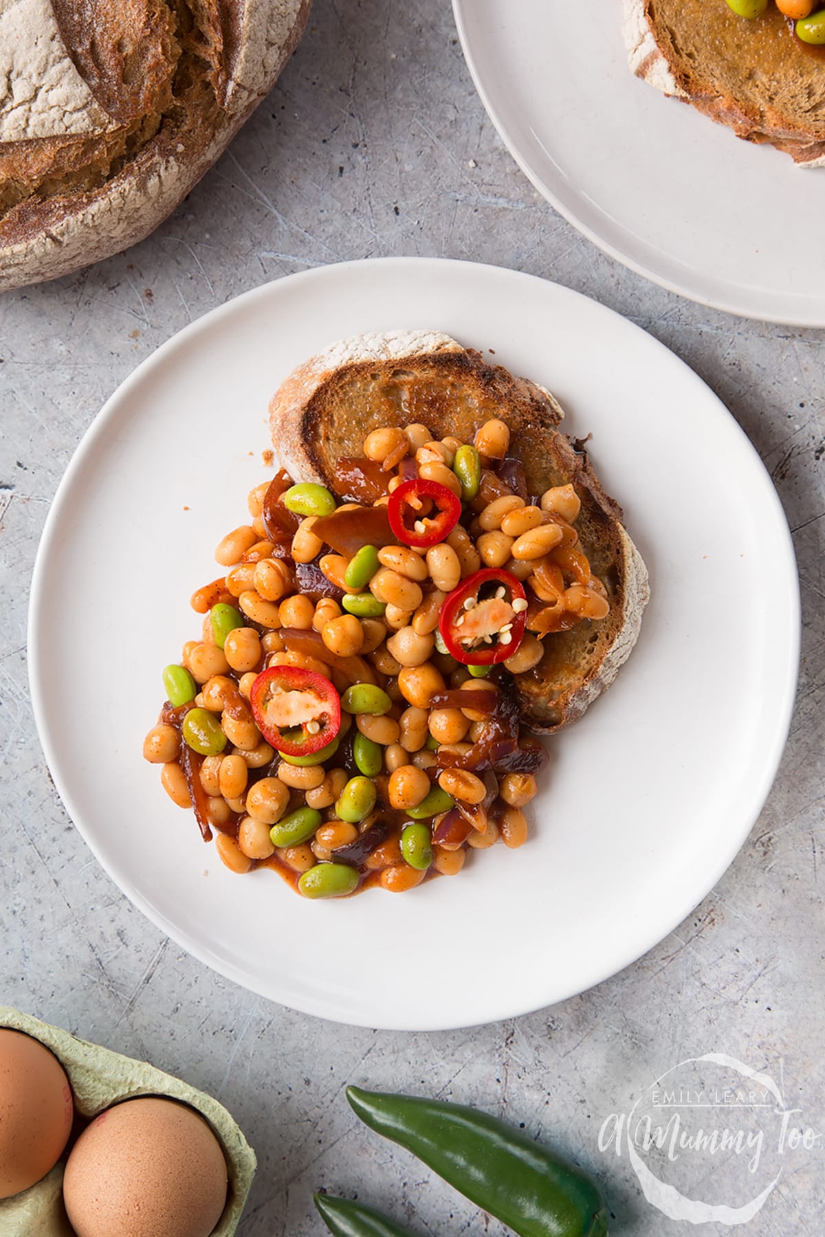 Breakfast beans with chilli, chickpeas and edamame served on sour dough toast. 