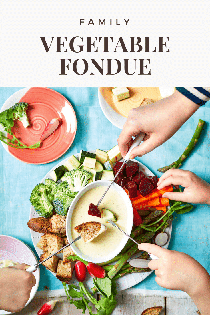 A vegetable fondue platter on a blue background. A family of hands reach in with fondue forks to dip bread, beetroot, courgette into cheese sauce. The caption reads: family vegetable fondue