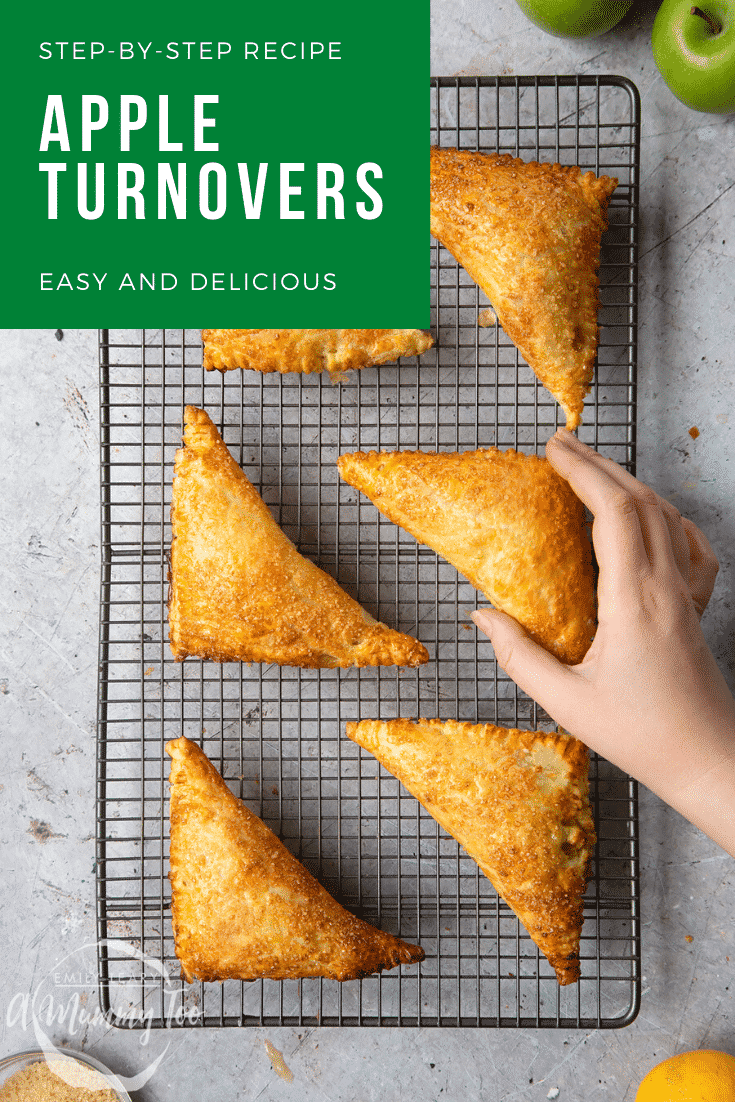 graphic text STEP-BY-STEP RECIPE APPLE TURNOVERS EASY AND DELICIOUS above Overhead shot of a hand holding an apple cinnamon turnover with a mummy too logo in the lower-left corner.