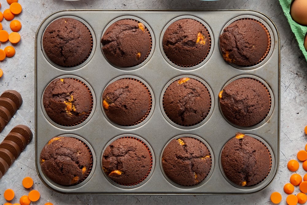 Overhead shot of chocolate orange muffins in muffin tray