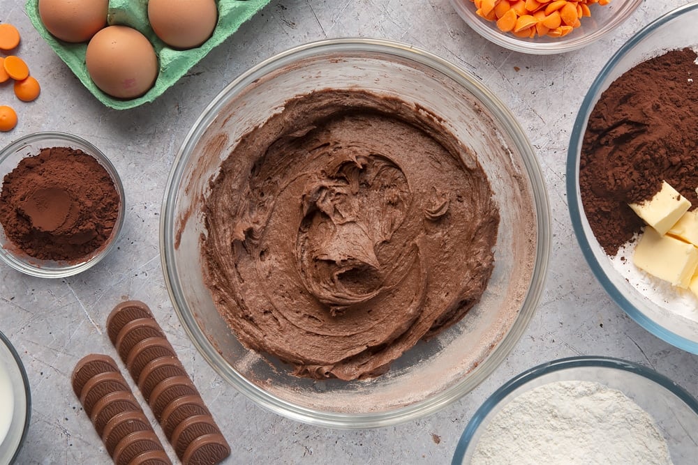 Overhead shot of chocolate batter in a large mixing bowl