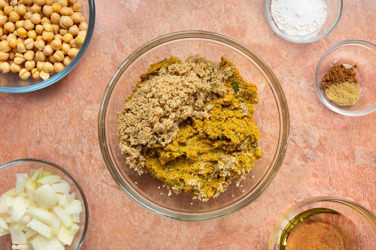 A bowl of harissa falafel paste and cooked quinoa.