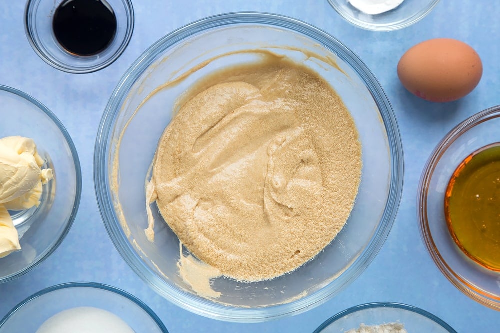 Overhead shot of butter mix in a large clear bowl