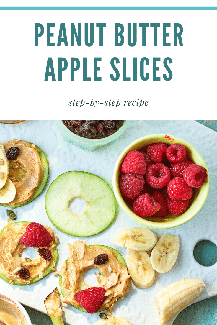 Apple slices topped with peanut butter on a white board surrounded by other topping ingredients in bowls. The caption reads: peanut butter apple slices step-by-step recipe