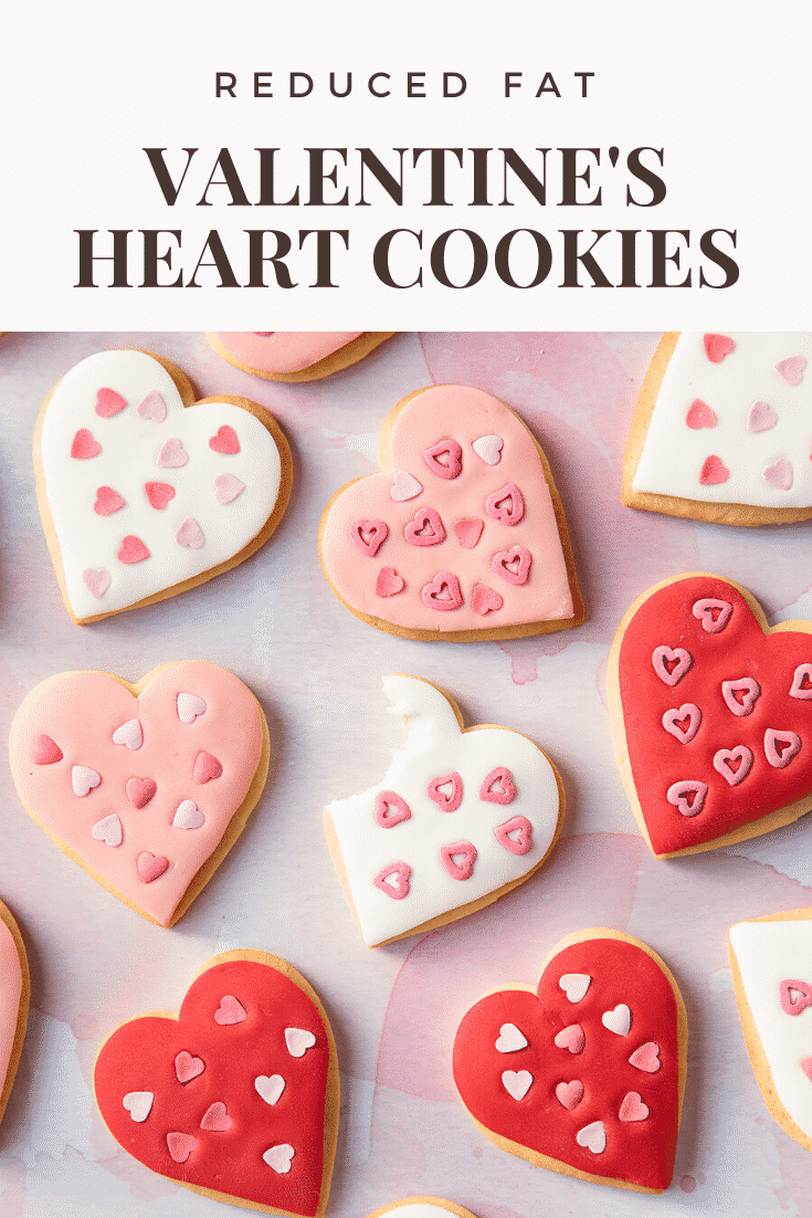 graphic text REDUCED FAT VALENTINE'S DAY COOKIES above Overhead shot of valentines day cookies