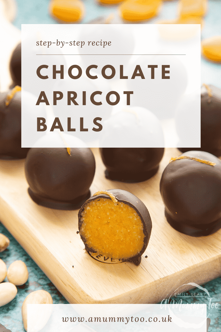 Chocolate apricot balls arranged on a wooden board. Dried apricots, blanched almonds and squares of dark chocolate surround the board. In the foreground sits half a ball, revealing the bright orange filling. Caption reads: step-by-step recipe chocolate apricot balls.
