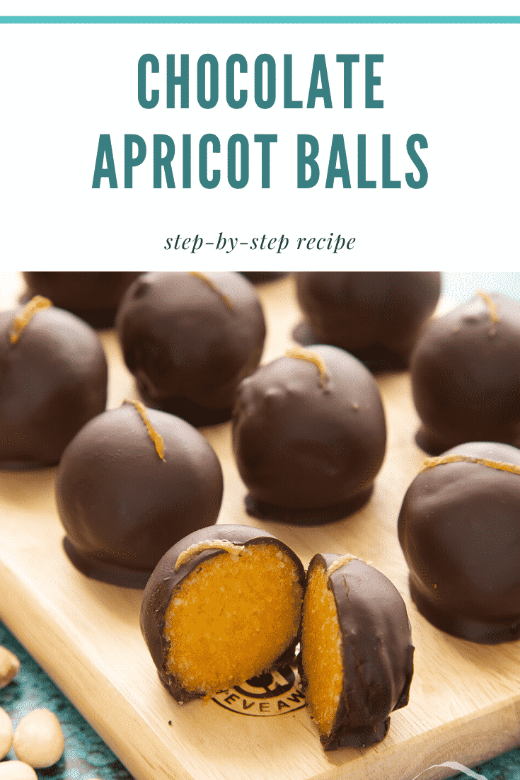 Chocolate apricot balls arranged on a wooden board. Dried apricots, blanched almonds and squares of dark chocolate surround the board. The ball in the foreground has been cut in two, revealing the bright orange filling. Caption reads: Chocolate apricot balls step-by-step recipe.