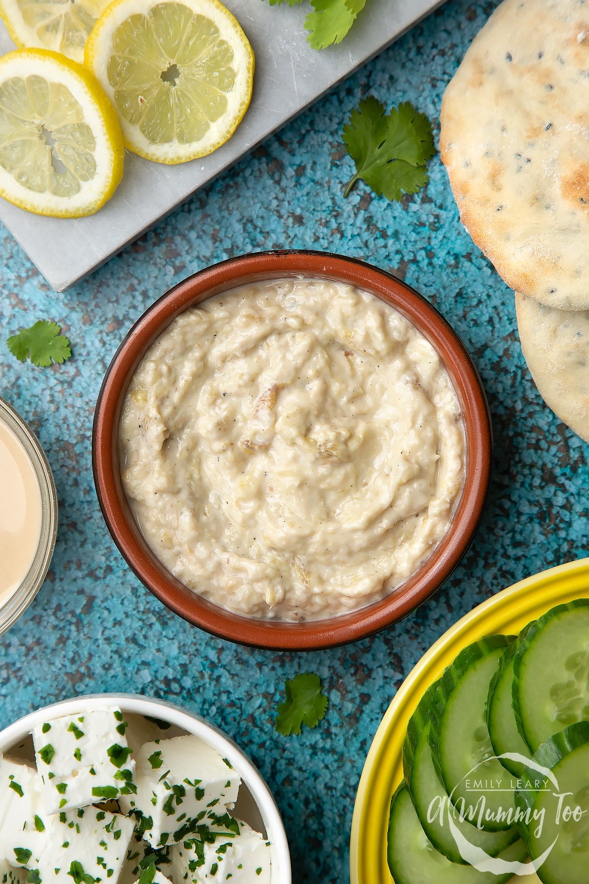 Baba ganoush in a small, shallow teracotta dish.