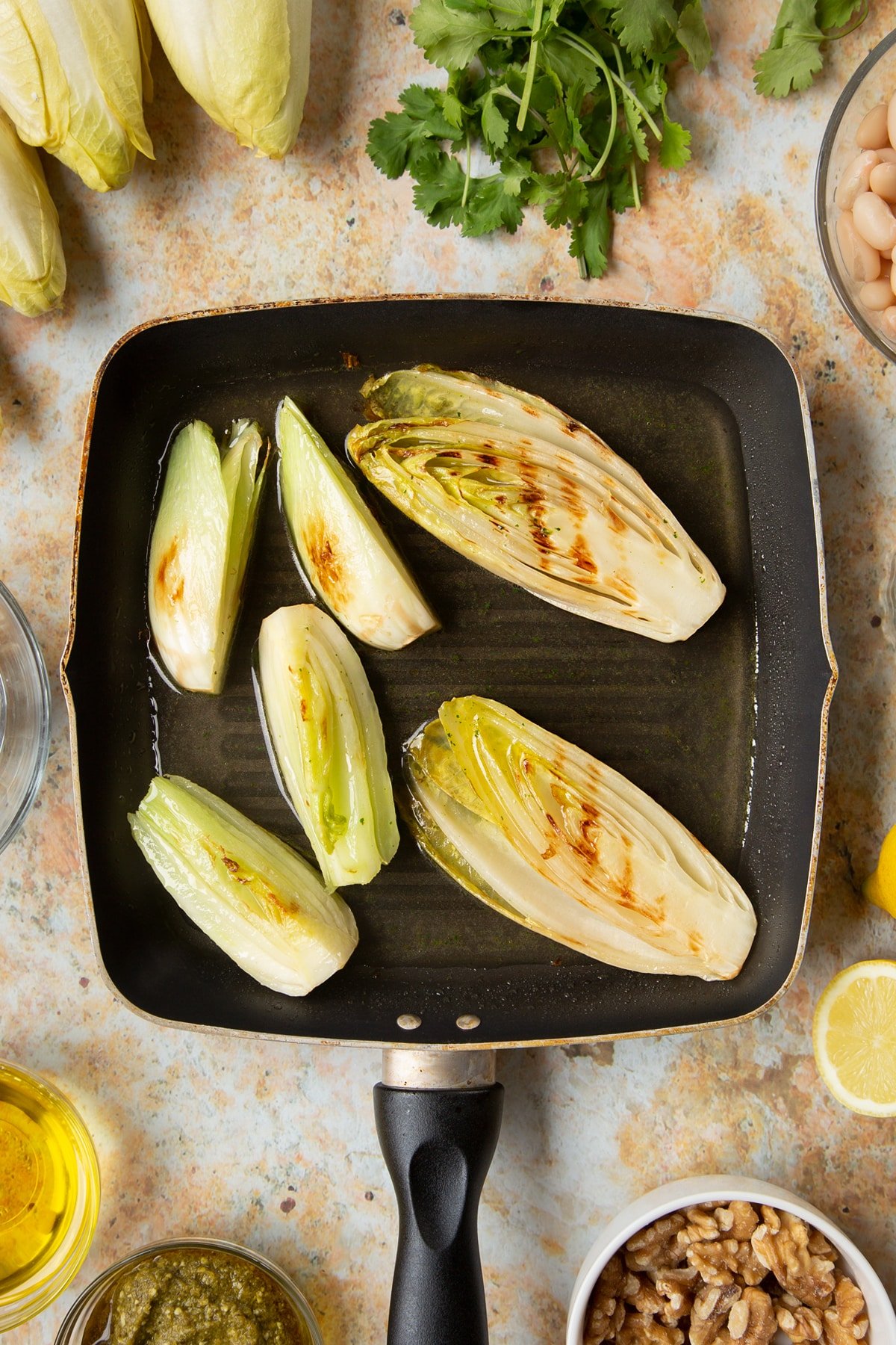 Chicory and fennel braising in a griddle pan.