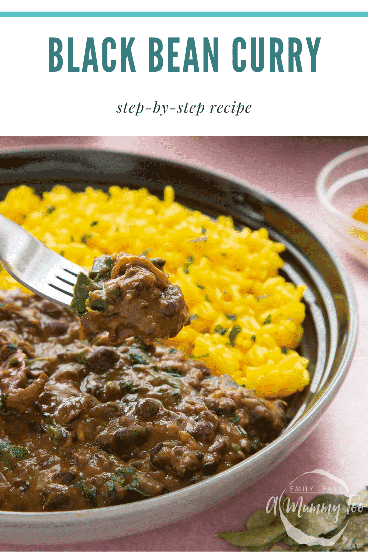 Black bean curry served to a shallow grey bowl with yellow rice. A fork reaches in. Caption reads: black bean curry step-by-step recipe