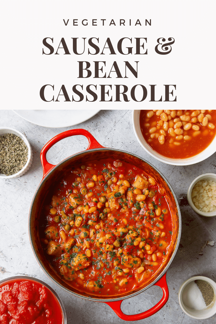 Veggie sausage and bean casserole in a large red pot. Caption reads: vegetarian sausage & bean casserole