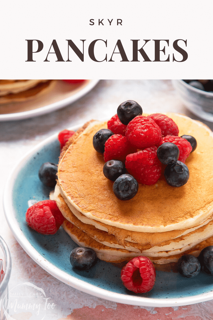 Skyr pancakes served with berries. Caption reads: skyr pancakes