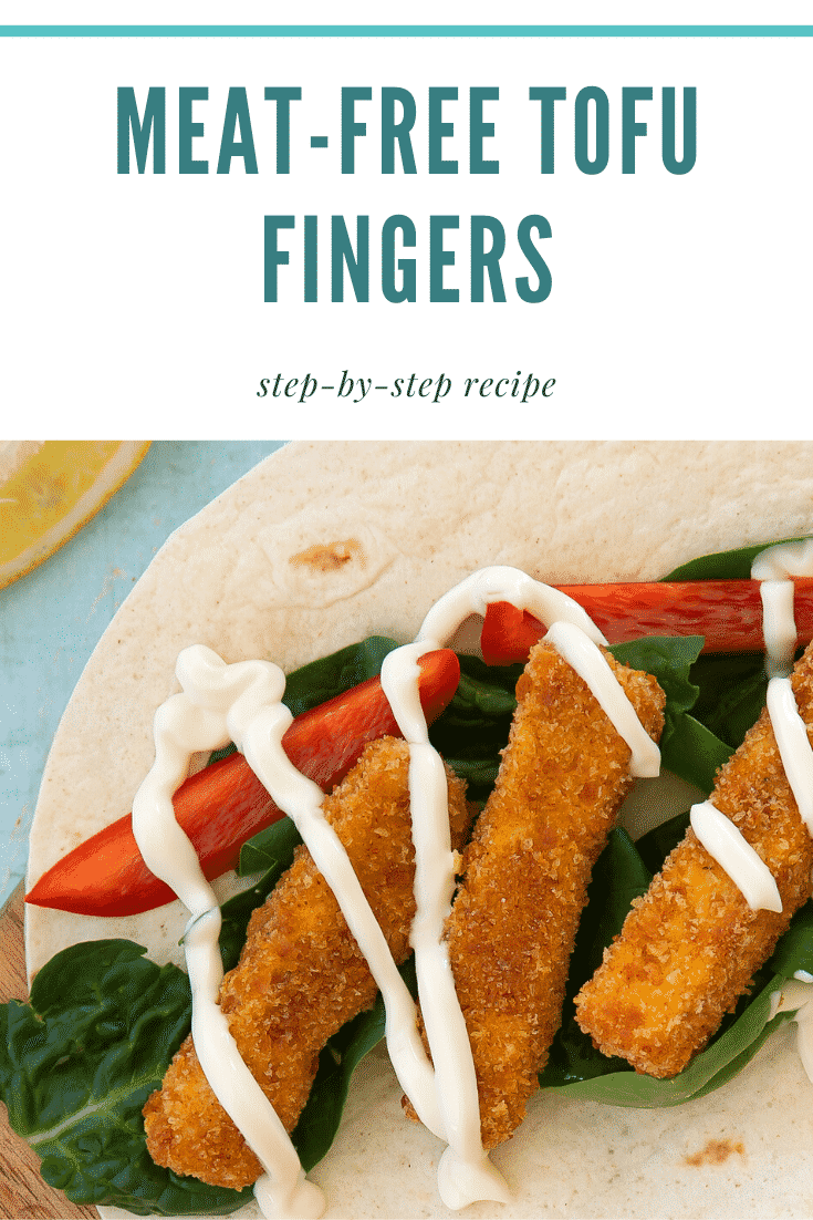 Flour tortillas filled with tofu fish sticks, salad and mayo on a wooden board. Caption reads: meat-free tofu fish sticks step-by-step recipe