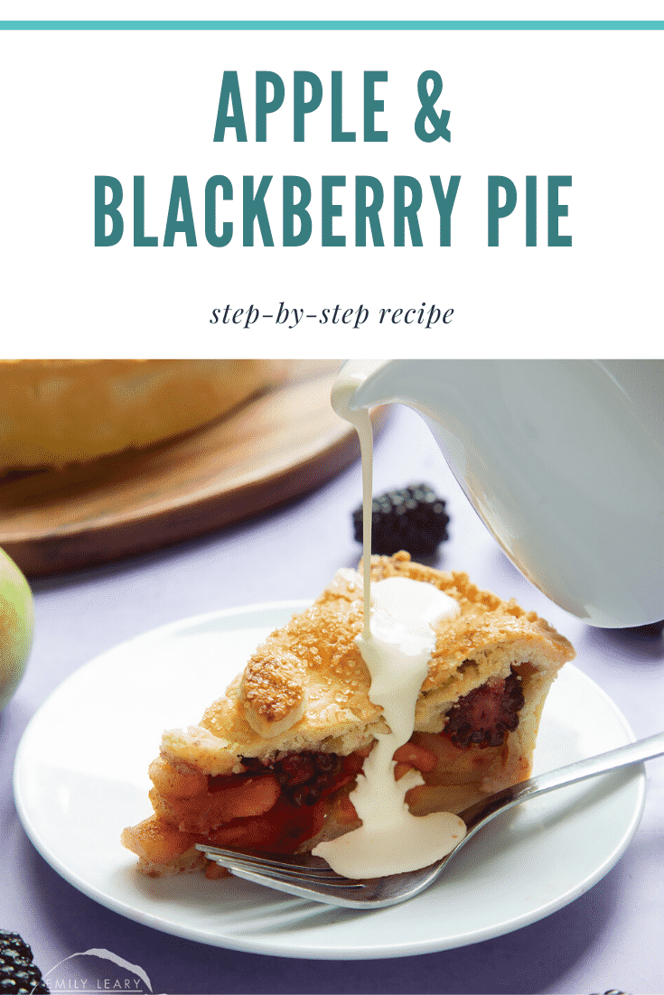 A slice of apple and blackberry pie on a white plate with a fork. Cream has been poured on top. Caption reads: apple & blackberry pie step-by-step recipe