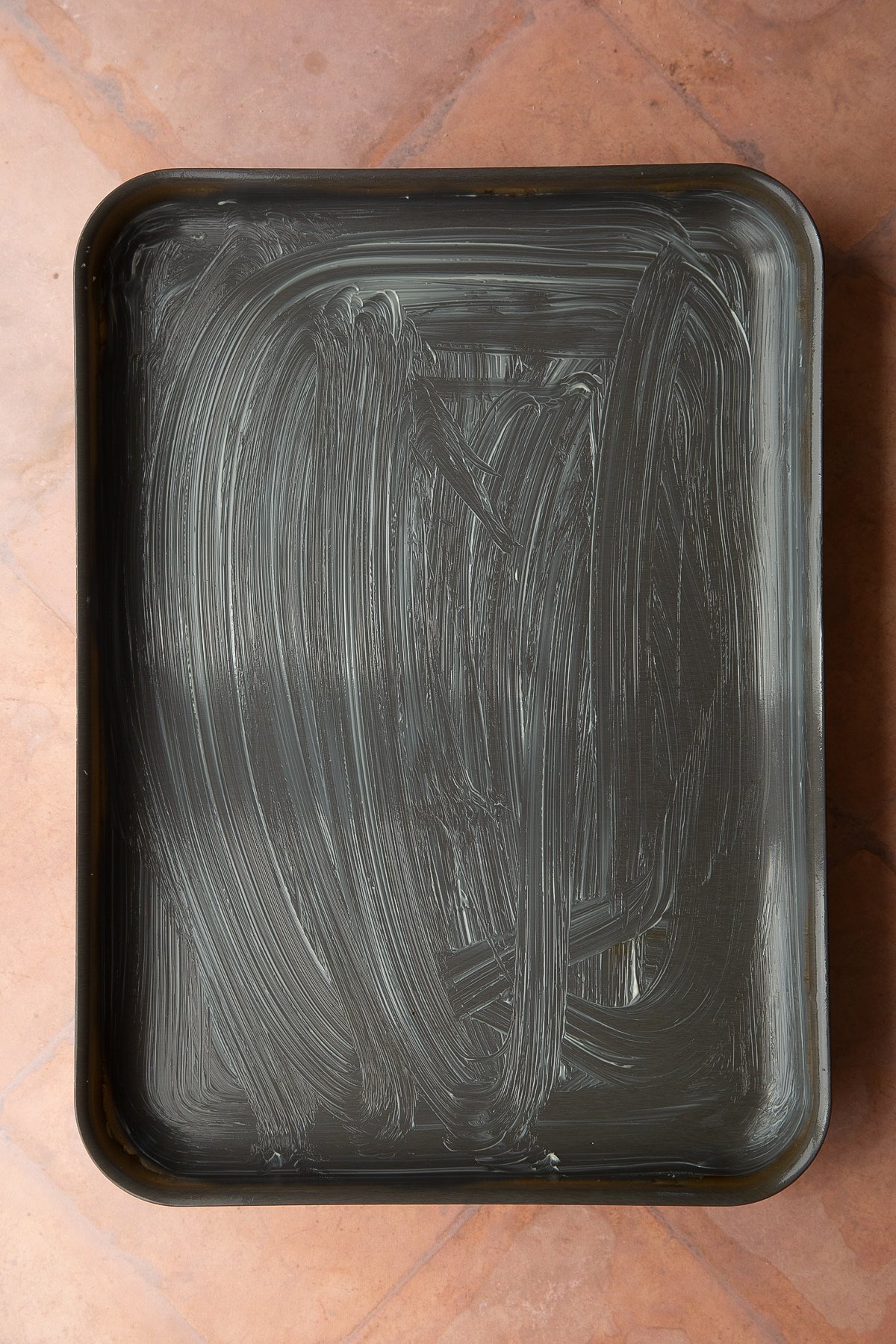 A greased tray.