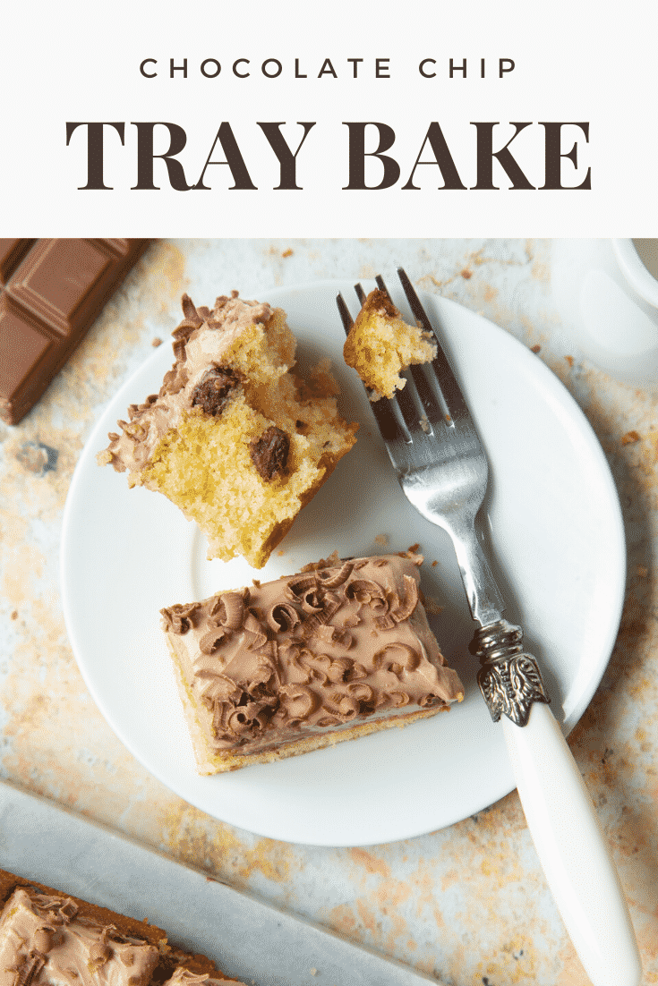 Chocolate chip tray bake on a white plate with a fork. Caption reads: chocolate chip tray bake