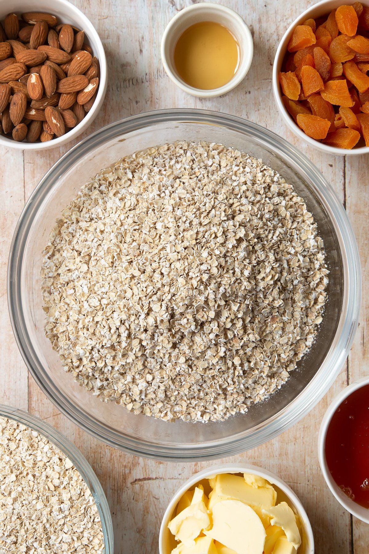 Overhead shot of oats in a large clear bowl