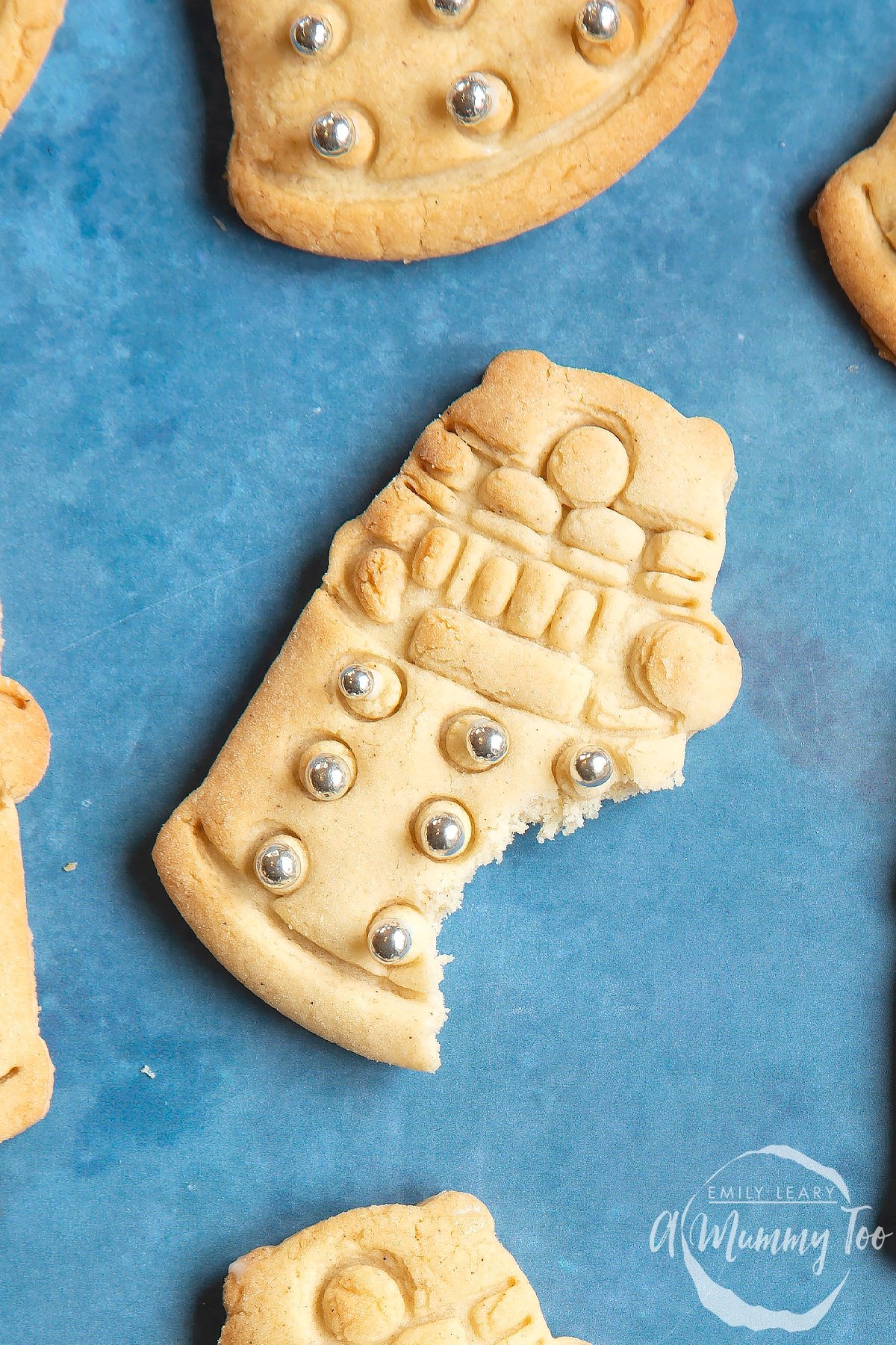 Close up of a Dalek cookie with a bite out of it.