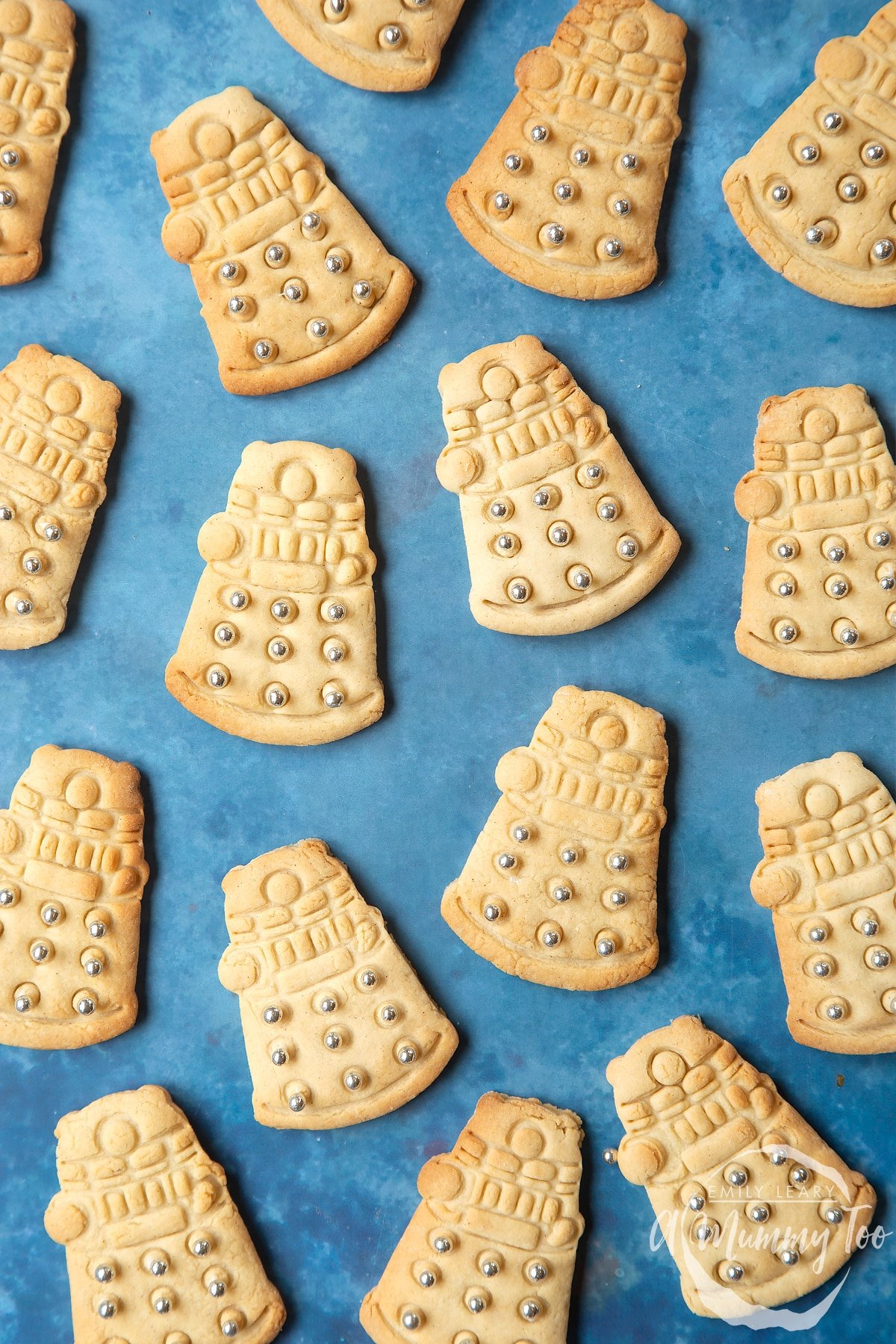 Dalek sugar cookies decorated with silver candy balls. 