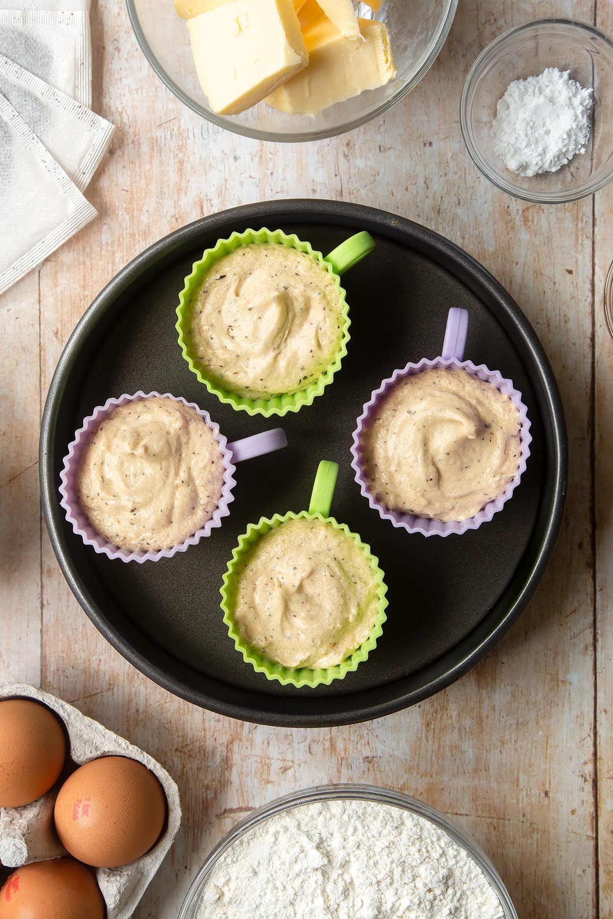 Overhead shot of Earl Grey cupcakes inside a silicone casing 