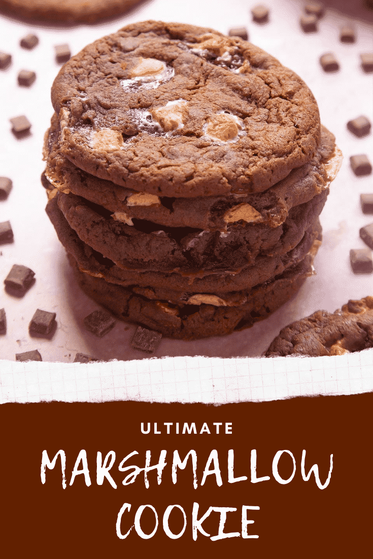 Forward shot of a stack of ultimate marshmallow cookies. At the bottom of the image there's some text describing the image for Pinterest.