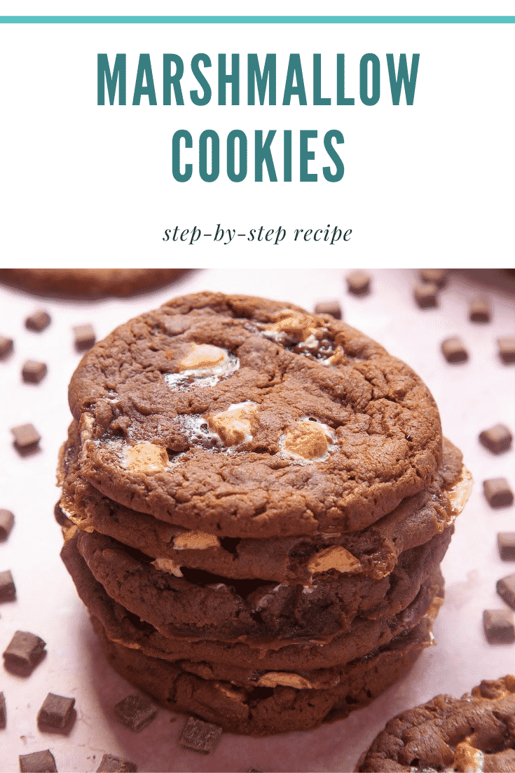 Forward shot of a stack of ultimate marshmallow cookies. At the top of the image there's some text describing the image for Pinterest.