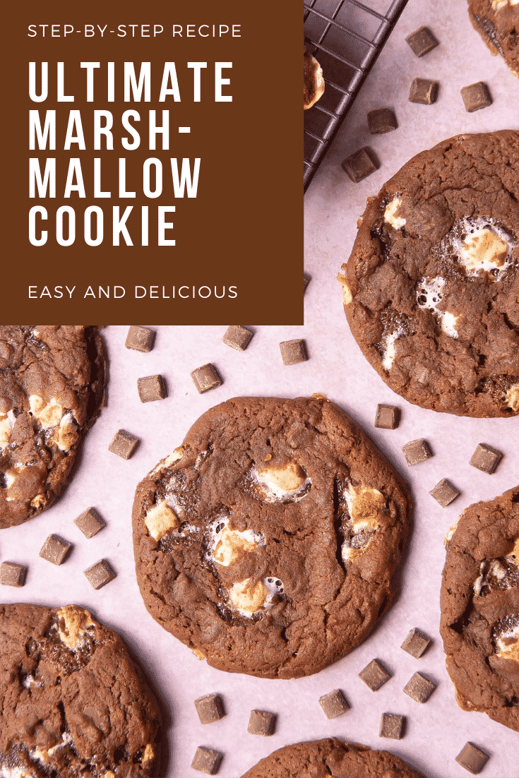 Overhead shot of a stack of ultimate marshmallow cookies. At the top right hand side of the image there's some text describing the image for Pinterest.