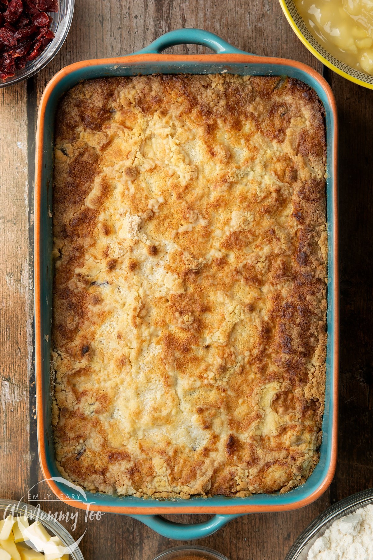 Apple cranberry dump cake in a tray.