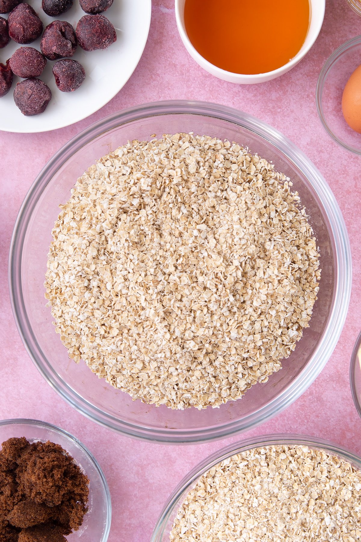 Overhead shot of oats in a large clear bowl