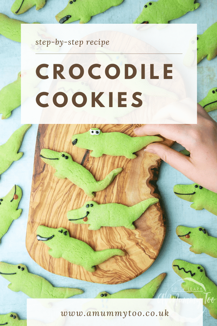 graphic text step-by-step recipe CROCODILE COOKIES above Overhead shot of a hand holding a green Crocodile sugar cookie  with website URL below