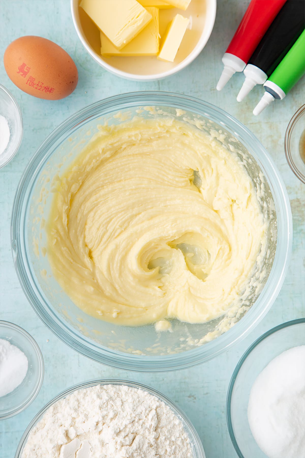 Overhead shot of combined and fluffy butter mix in a bowl