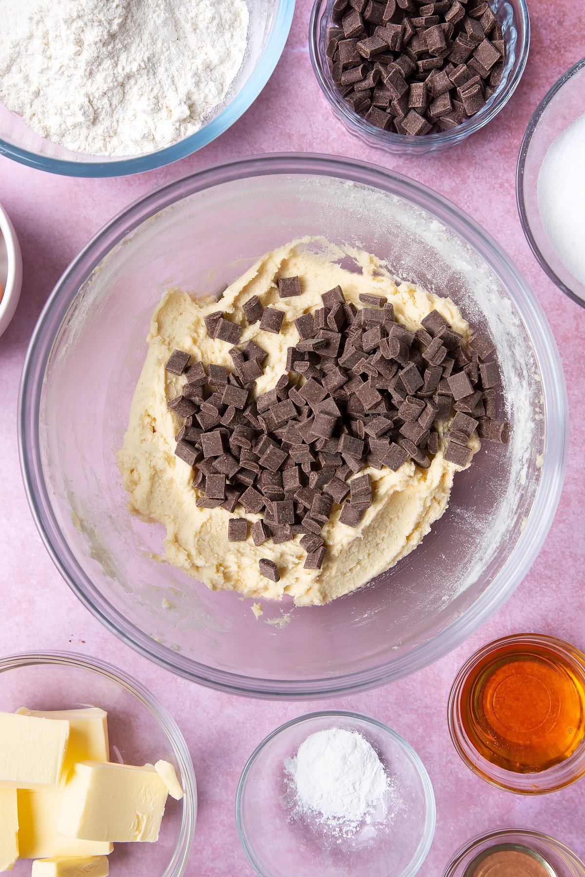 Overhead shot of Dark chocolate sea salt cookies ingredients in a clear bowl