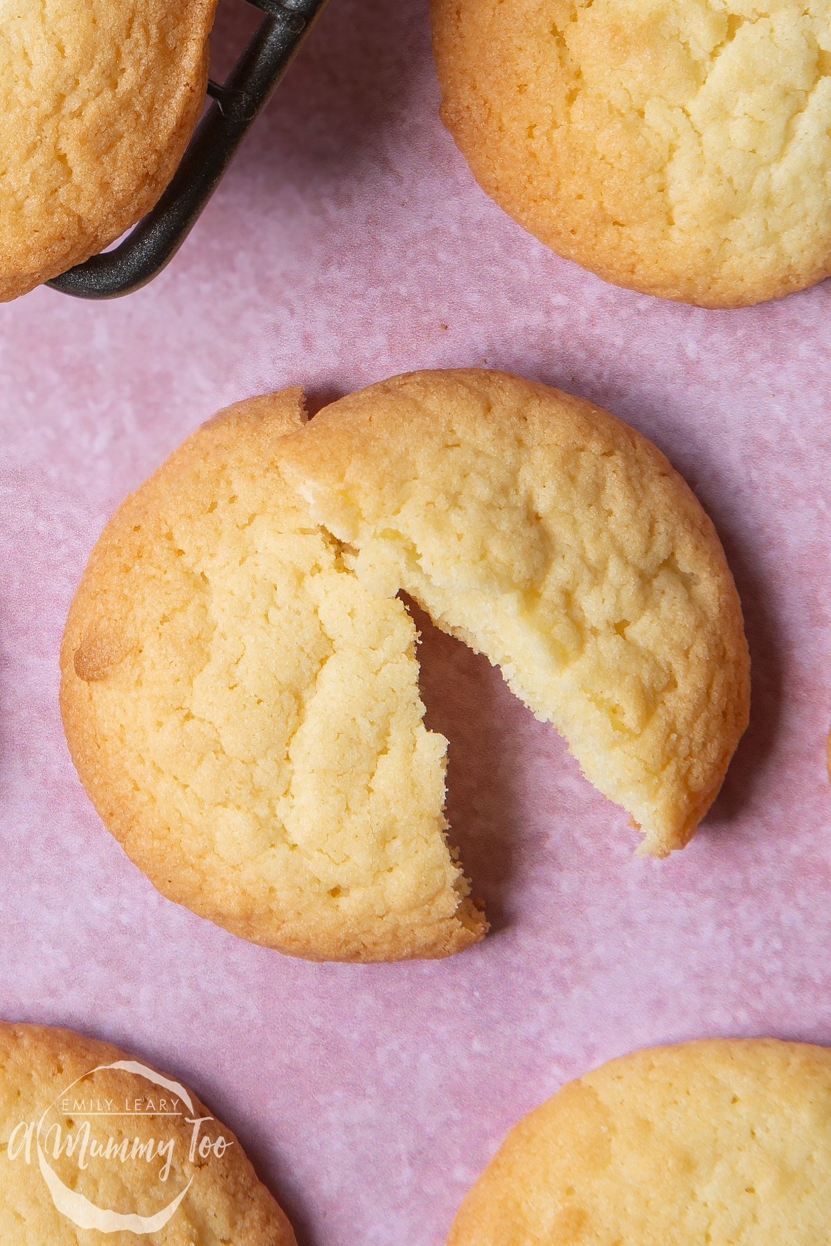 Close up overhead shot of the cookies on a pink counter top.