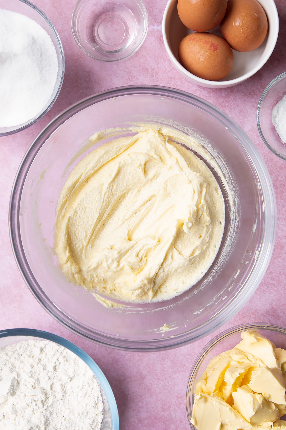 Overhead shot of mixed margarine and sugar in a mixing bowl
