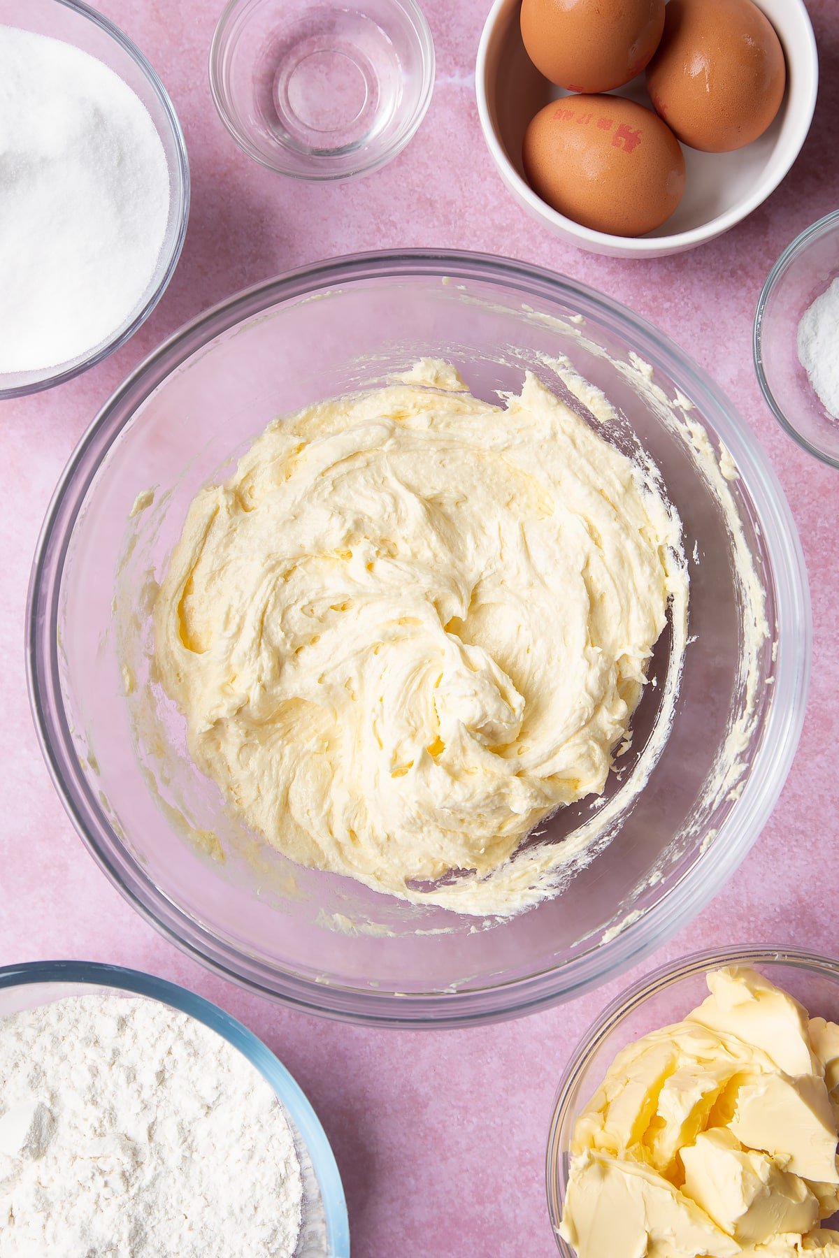 Overhead shot of flour and baking powder in a mixing bowl