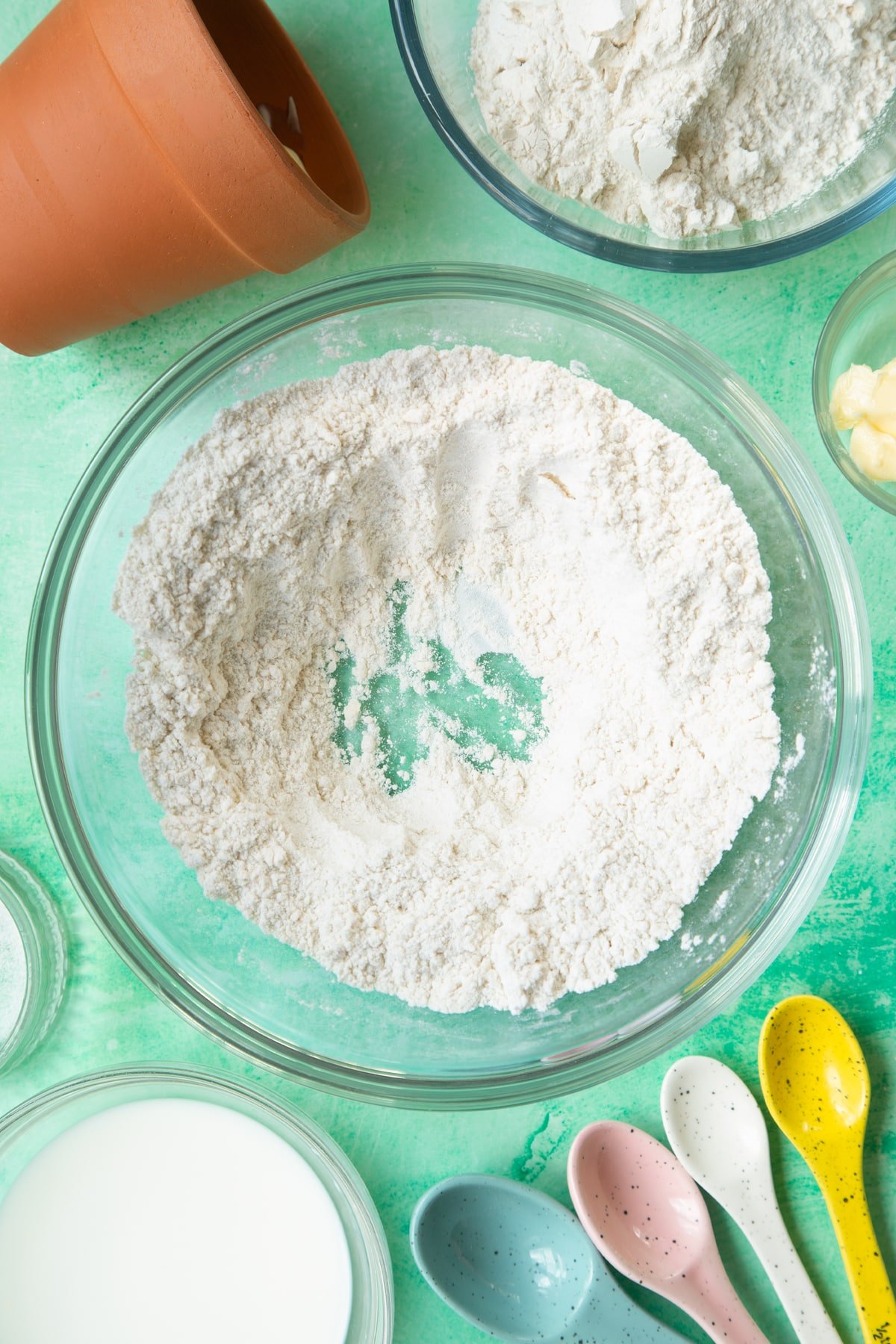 Overhead shot of flour in a large bowl