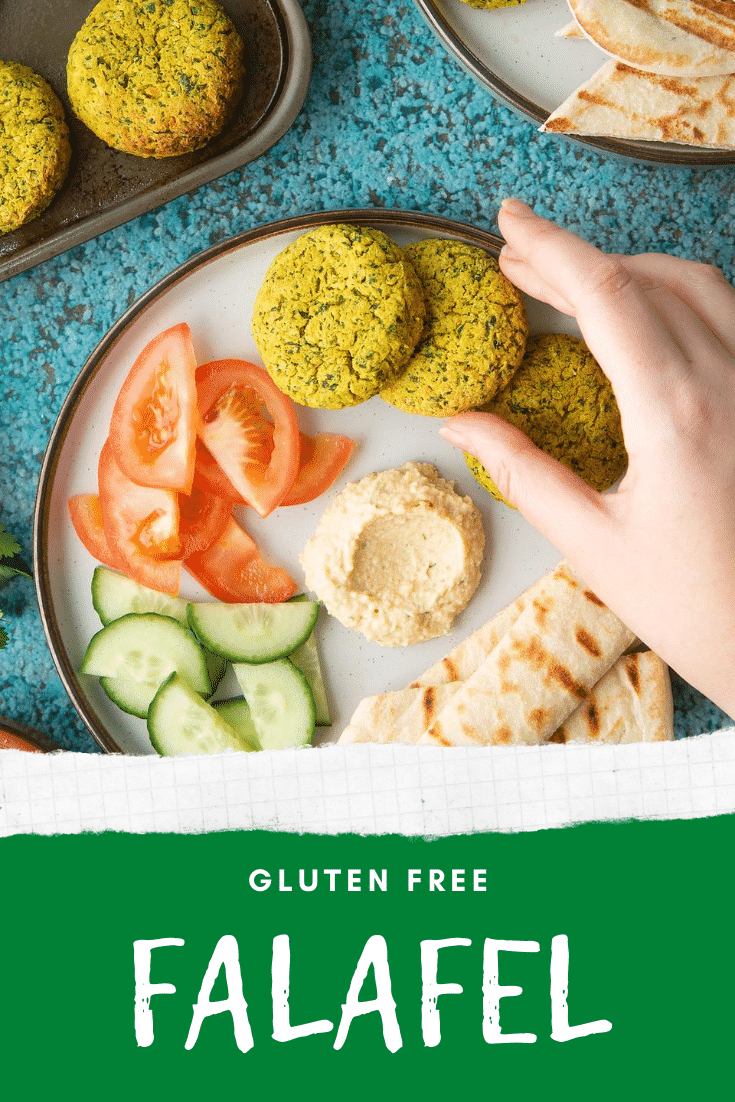 Gluten-free falafel on a plate with tomatoes, cucumber, hummus and griddled flatbread. Caption reads: gluten free falafel