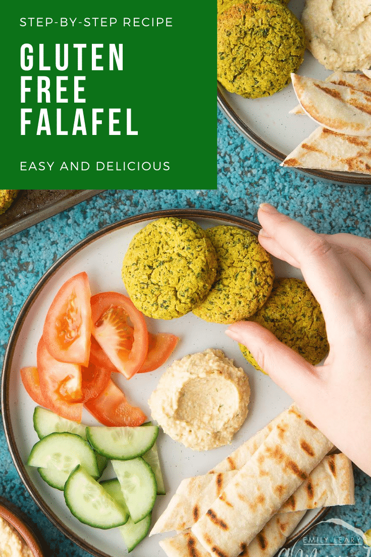 Gluten-free falafel on a plate with tomatoes, cucumber, hummus and griddled flatbread. Caption reads: step-by-step recipe gluten free falafel easy and delicious