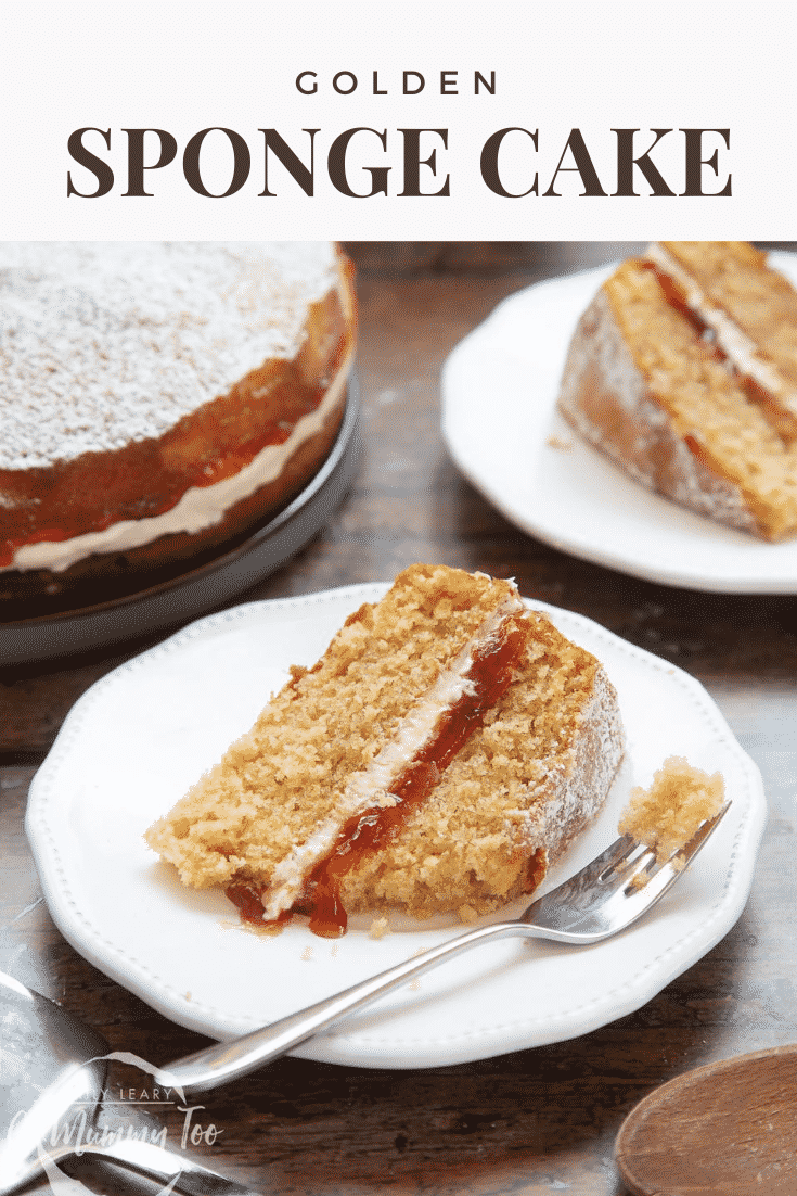 graphic text GOLDEN SPONGE CAKE above a golden sponge cake with jam and icing with a mummy too logo in the lower-left corner