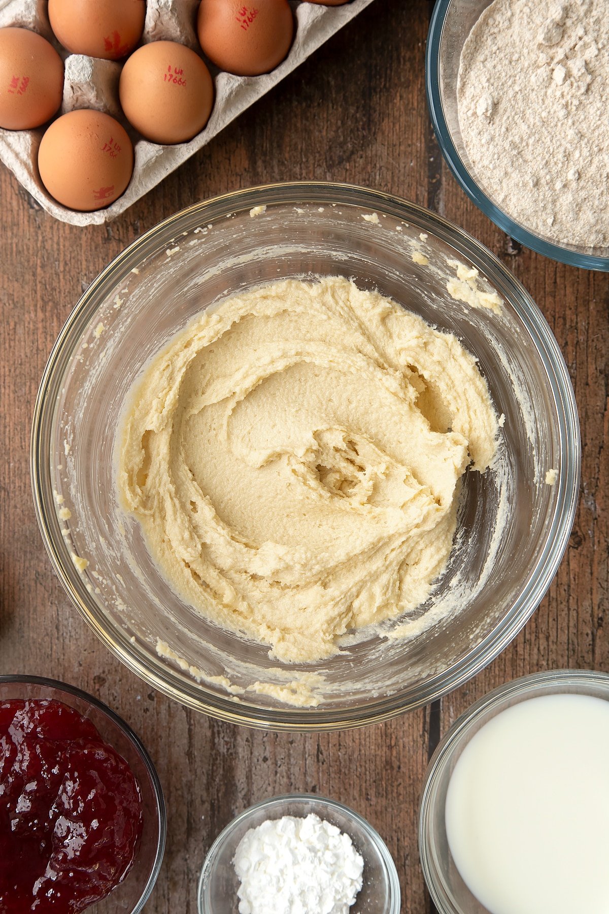 Overhead shot of buttermix in a large clear mixing bowl