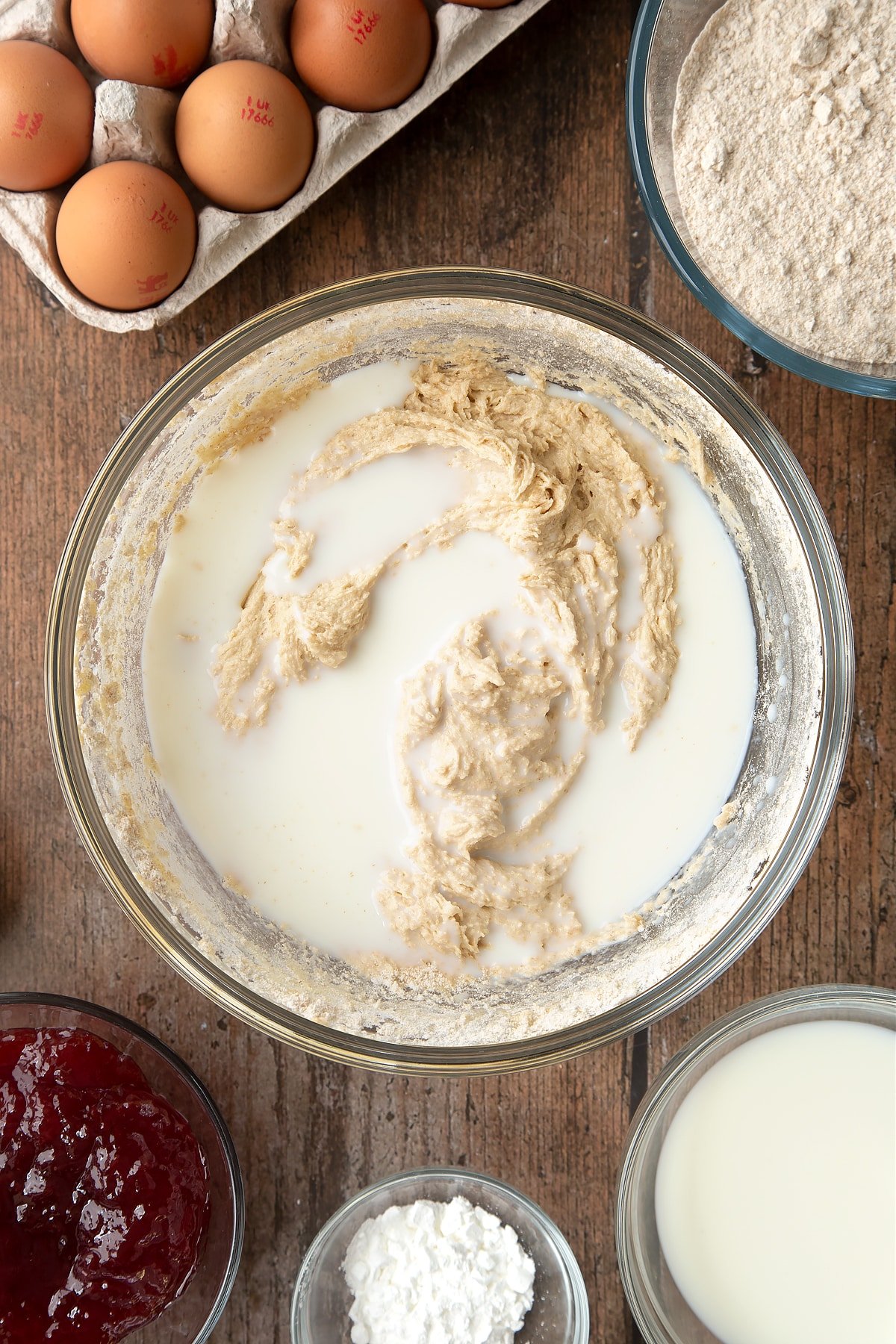 Overhead shot of vanilla and milk in a bowl