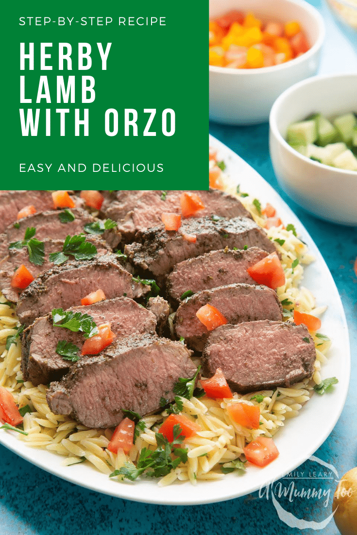 Slices of herby lamb arranged on a bed of orzo on an oval platter. A fork lifts some lamb. Caption reads: step-by-step recipe herby lamb with orzo easy and delicious