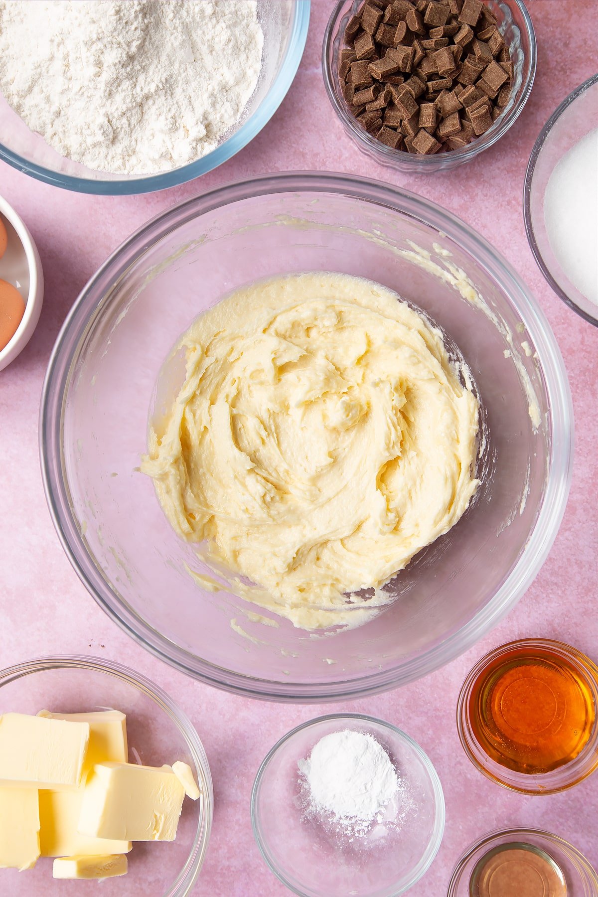 Overhead shot of mixed butter in a large clear bowl